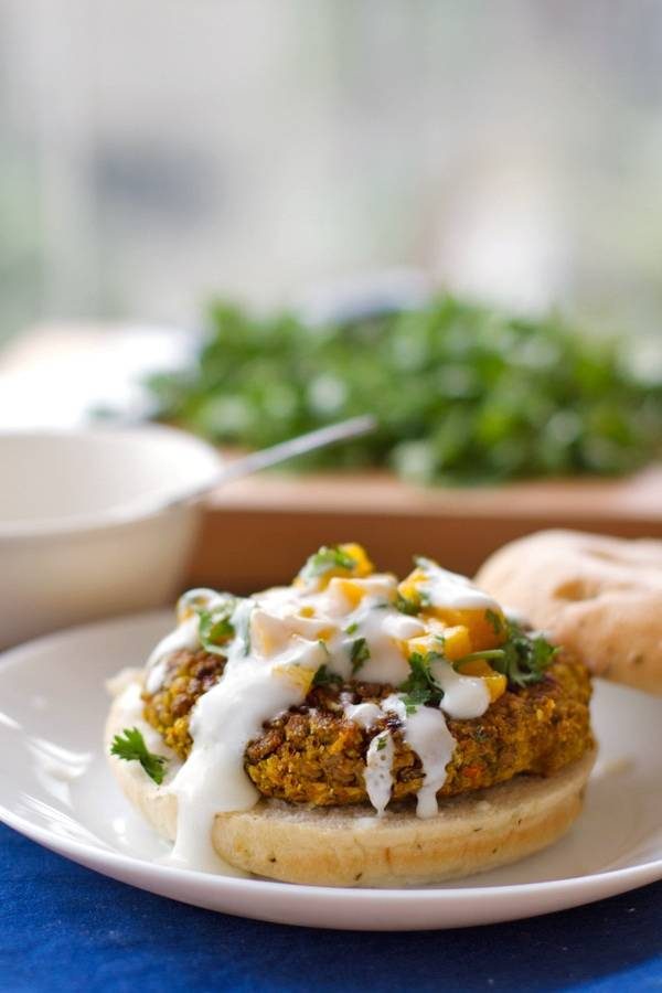 Curried veggie burger on a bun.