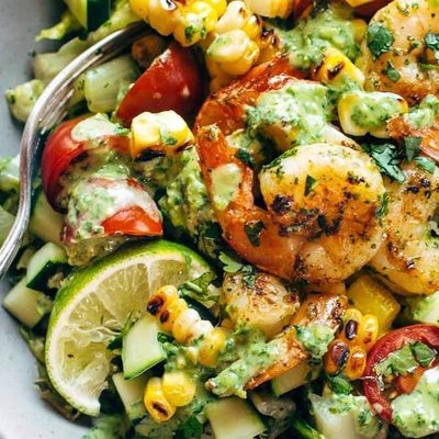 Detox Summer Salad in a bowl with fork.