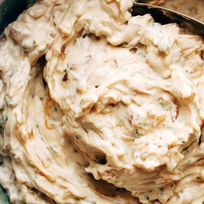 A large rustic bowl of onion dip.